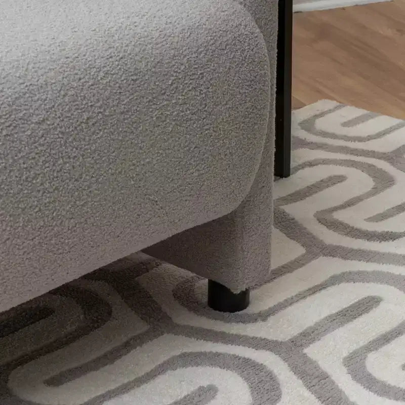 Poltrona Landon con rivestimento in finto shearling grigio chiaro